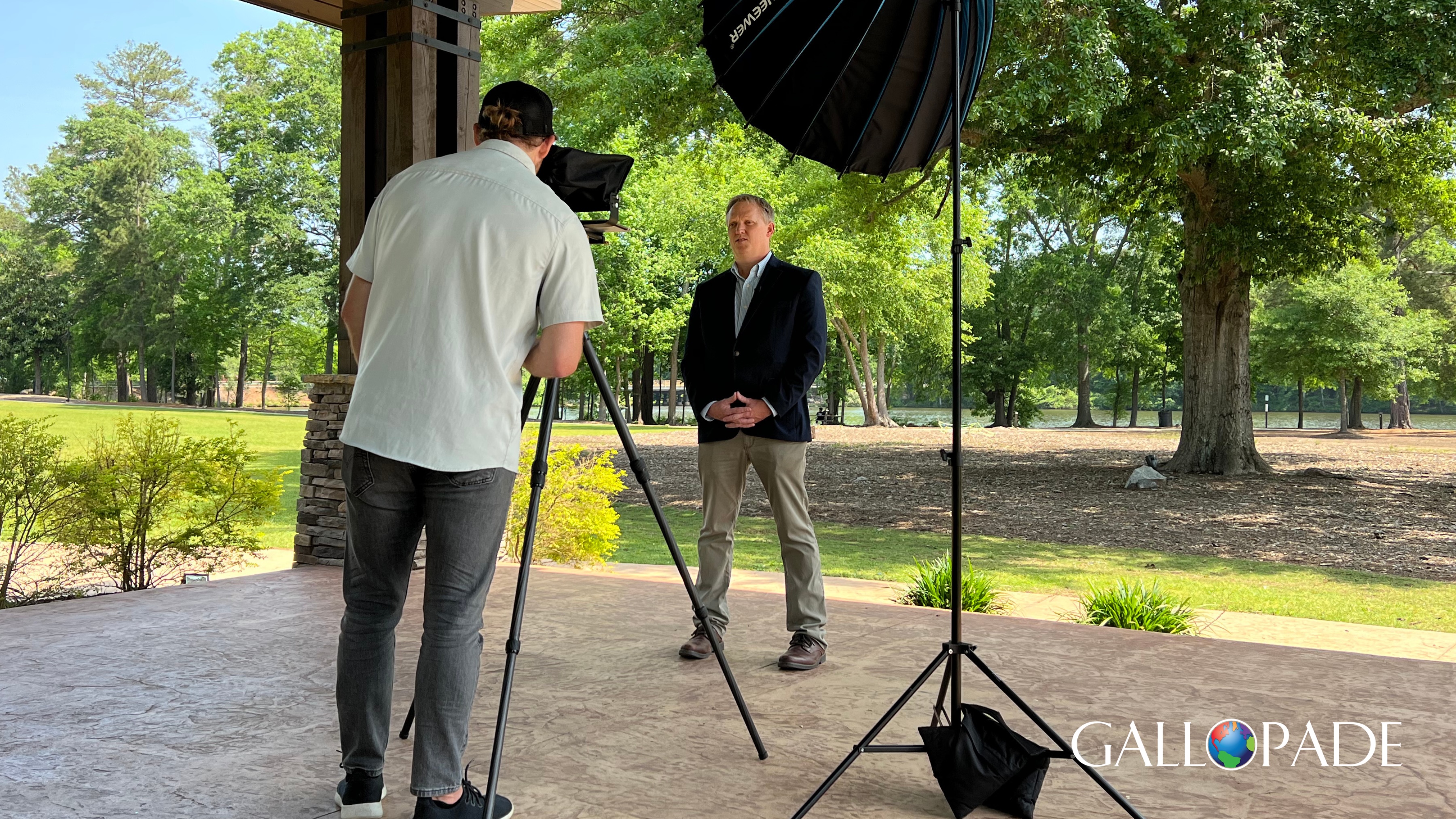 Gallopade's new CEO, Michael Longmeyer, is shown filming an introductory video for the company's standards-aligned, state-specific Social Studies curriculum resources.